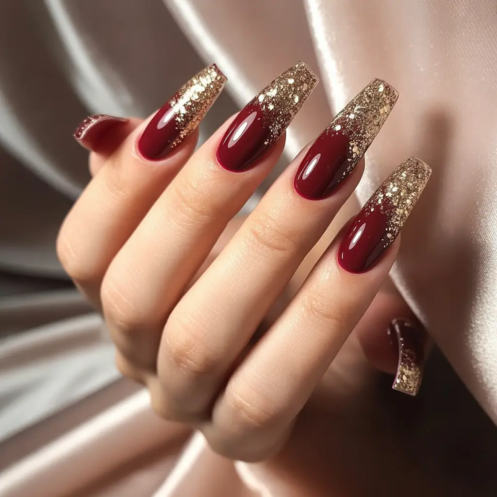 Burgundy Nails with Gold Glitter Tips