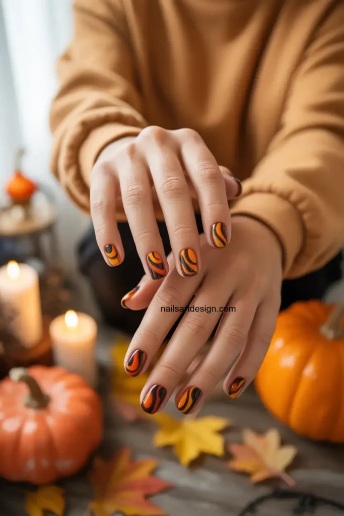 Black & Orange Swirl Nails