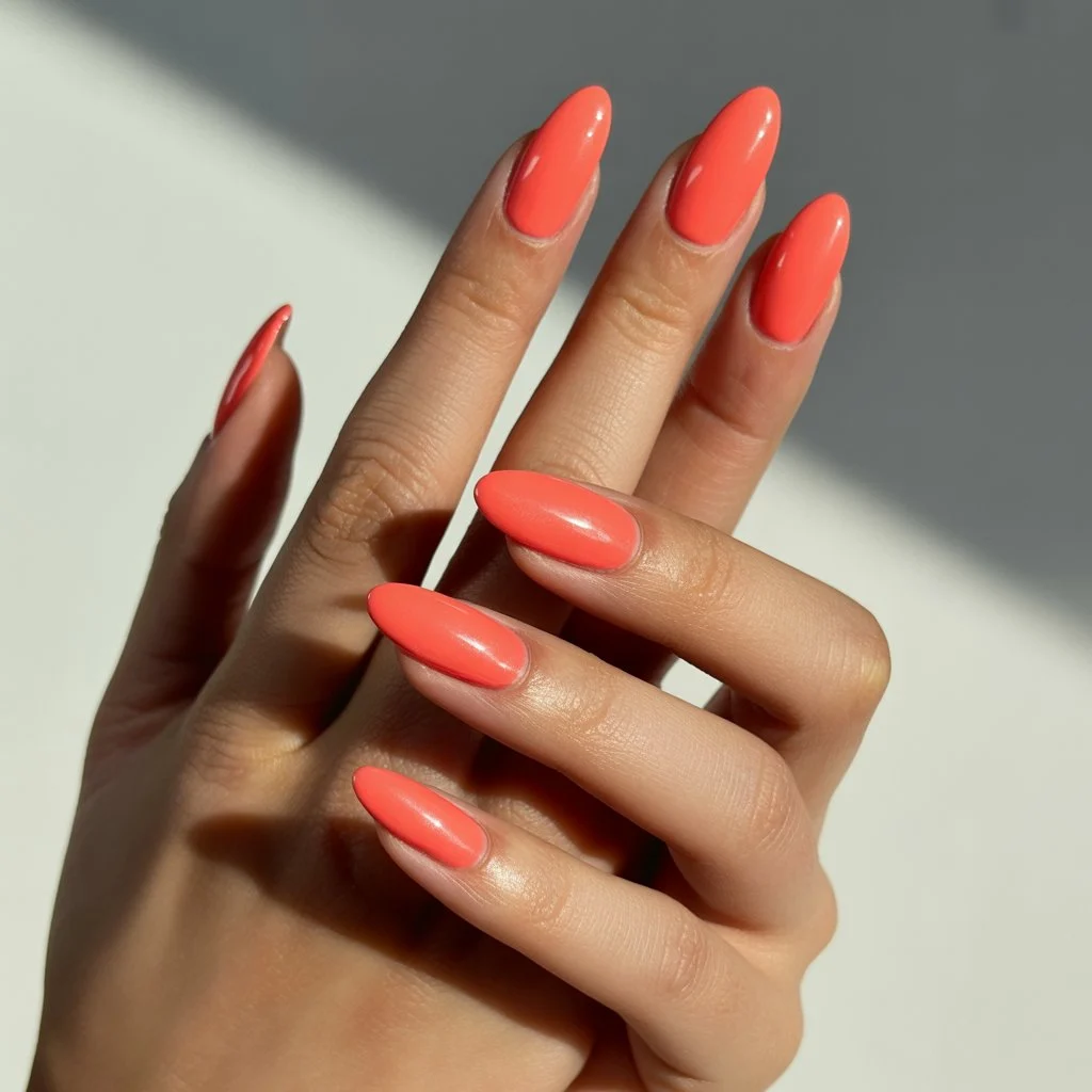 Juicy Coral Pop Almond Nails